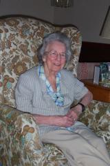 Grandma seated in the Turners’ chair