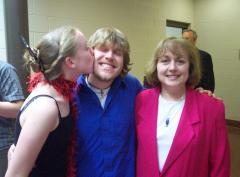 Jocelyn kissing Steve, with Kathy