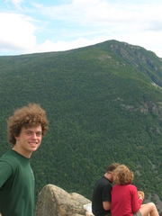 Kevin facing the viewer, with Mount Webster in the background