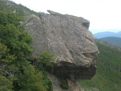 a rock juts out