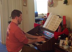 Steve playing an organ