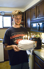 carrying the birthday cake