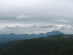 large, round-topped mountain