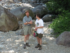 two guys with water bottles